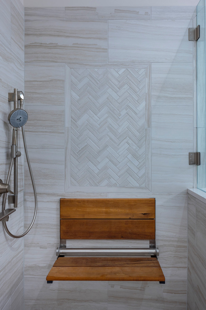 Walk-in shower - mid-sized transitional master beige tile and porcelain tile porcelain tile, beige floor and double-sink walk-in shower idea in Charleston with raised-panel cabinets, white cabinets, beige walls, an undermount sink, quartz countertops, white countertops and a built-in vanity