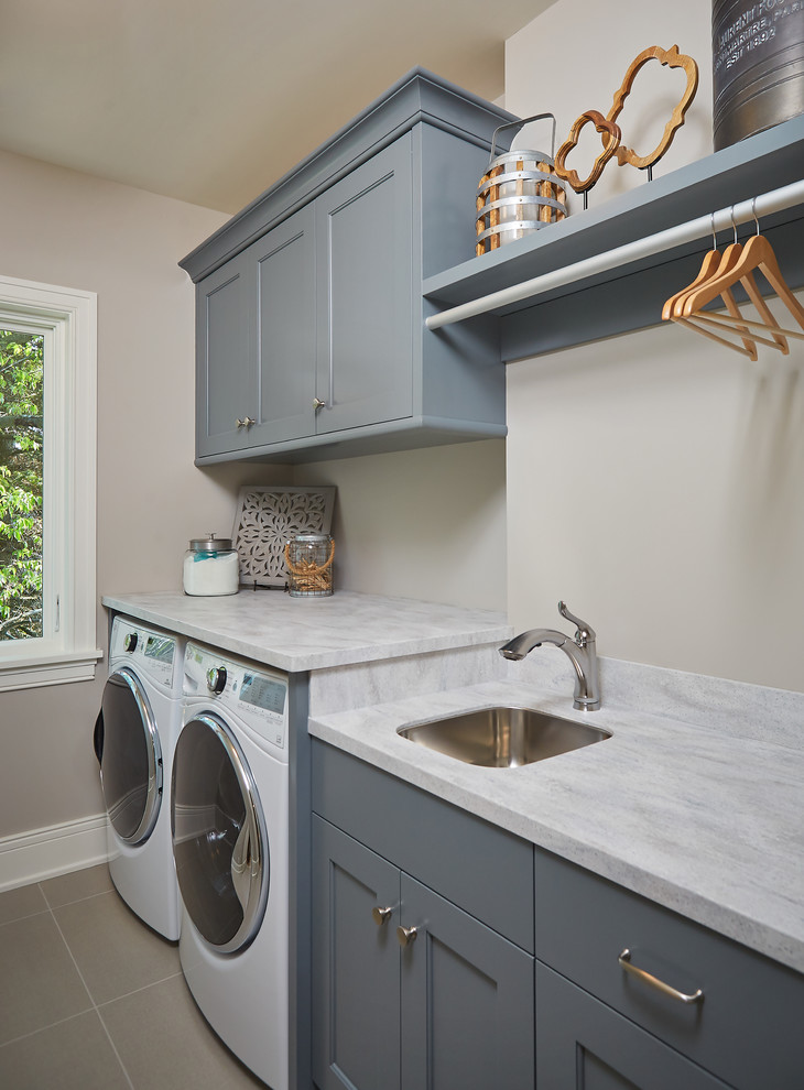 Inspiration for a coastal laundry room remodel in Grand Rapids