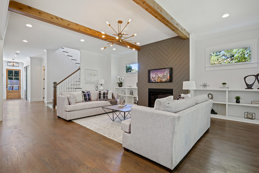 This is an example of a contemporary family room in Atlanta.