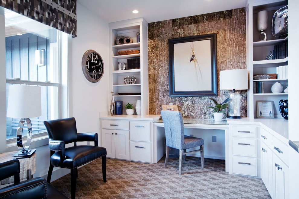 Inspiration for a transitional study room in Portland with white walls, carpet and a built-in desk.