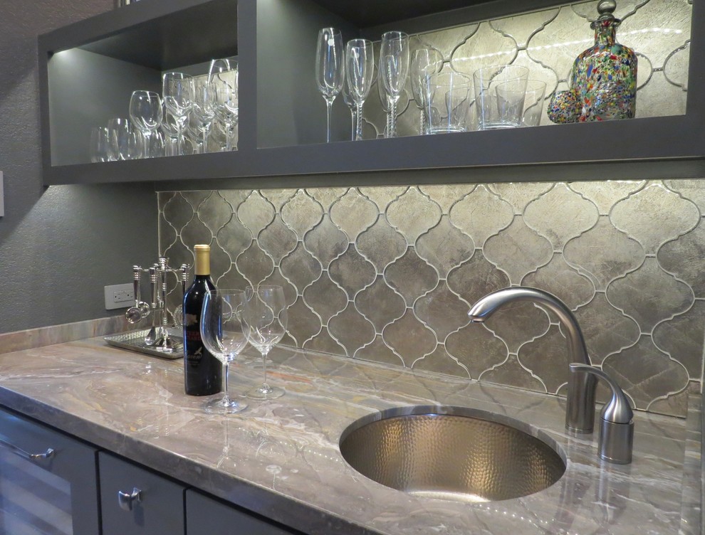 Design ideas for a small contemporary single-wall wet bar in Houston with an undermount sink, grey cabinets, glass tile splashback, grey splashback and open cabinets.