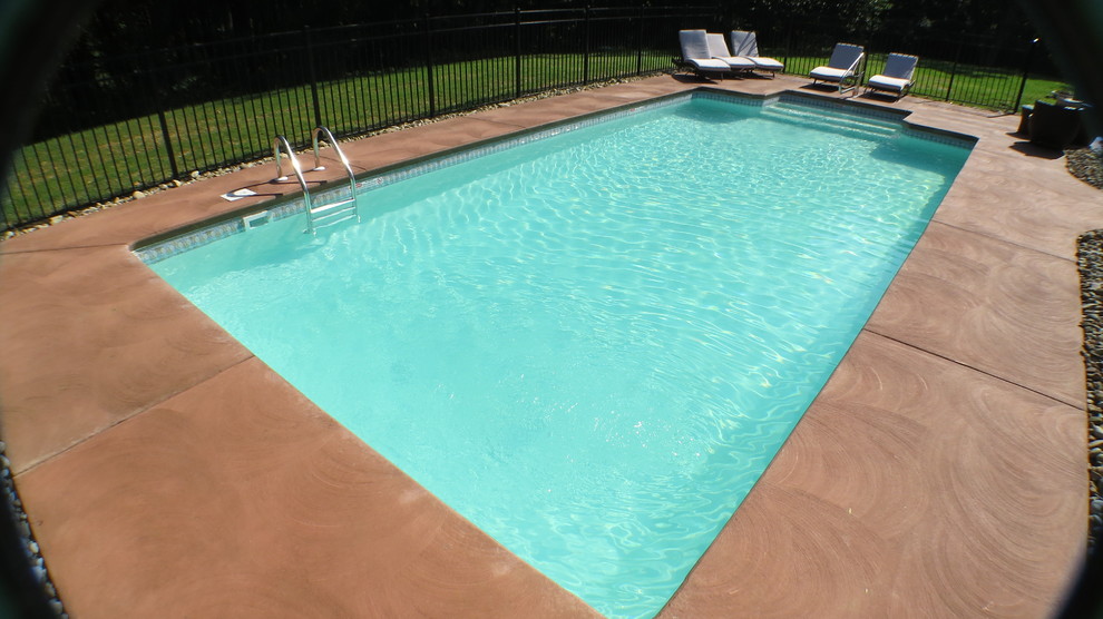 Pool - large modern backyard concrete and rectangular pool idea