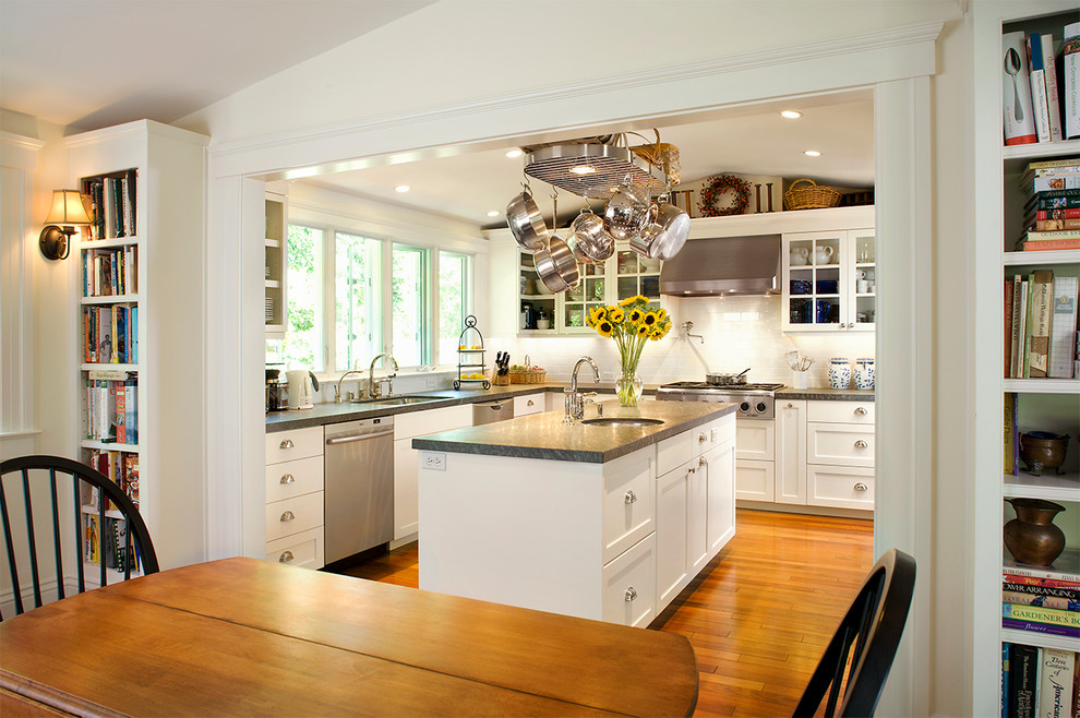 Design ideas for a traditional eat-in kitchen in San Francisco with an undermount sink, recessed-panel cabinets and white cabinets.