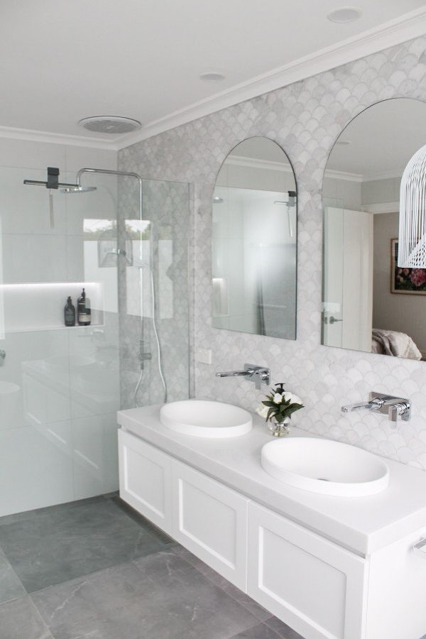 Design ideas for a large modern 3/4 bathroom in Perth with shaker cabinets, white cabinets, a claw-foot tub, an open shower, a one-piece toilet, multi-coloured tile, ceramic tile, grey walls, porcelain floors, a drop-in sink, solid surface benchtops, grey floor, an open shower, grey benchtops, an enclosed toilet, a double vanity, a floating vanity, wallpaper and decorative wall panelling.