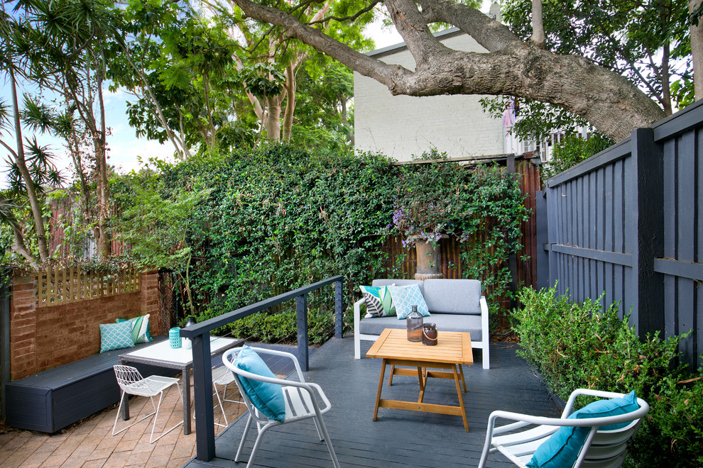Photo of a traditional courtyard garden in Sydney with decking.
