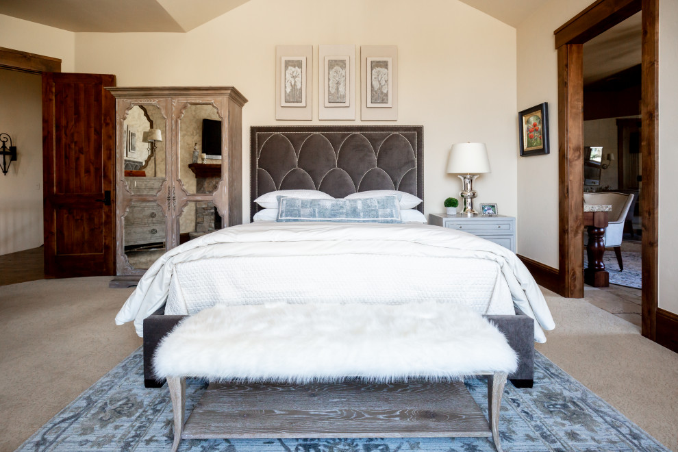 Photo of a country bedroom in Salt Lake City with beige walls, carpet, grey floor and vaulted.