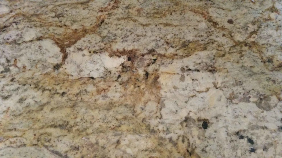 Example of a mid-sized transitional u-shaped eat-in kitchen design in Seattle with an undermount sink, recessed-panel cabinets, distressed cabinets, granite countertops, beige backsplash, stone tile backsplash, white appliances and a peninsula