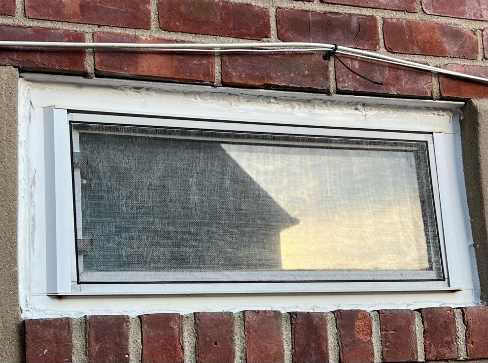 Caulking around window…