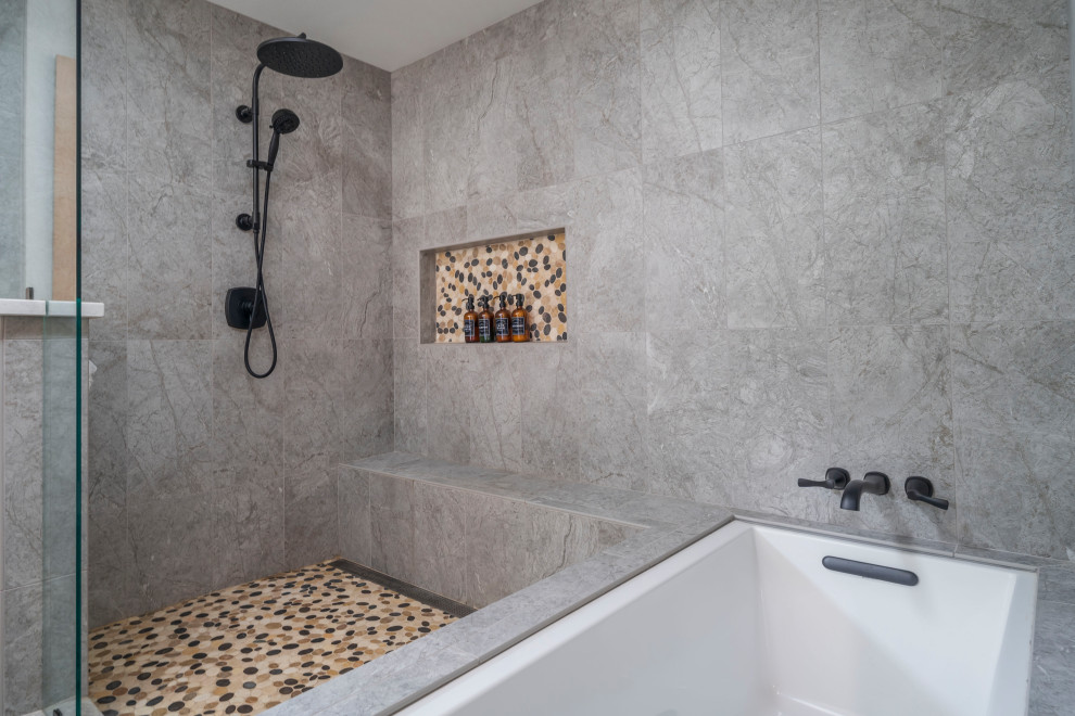 Large transitional master gray tile and porcelain tile vinyl floor, brown floor and double-sink bathroom photo in Los Angeles with recessed-panel cabinets, brown cabinets, an undermount tub, a two-piece toilet, white walls, an undermount sink, quartz countertops, white countertops, a niche and a built-in vanity