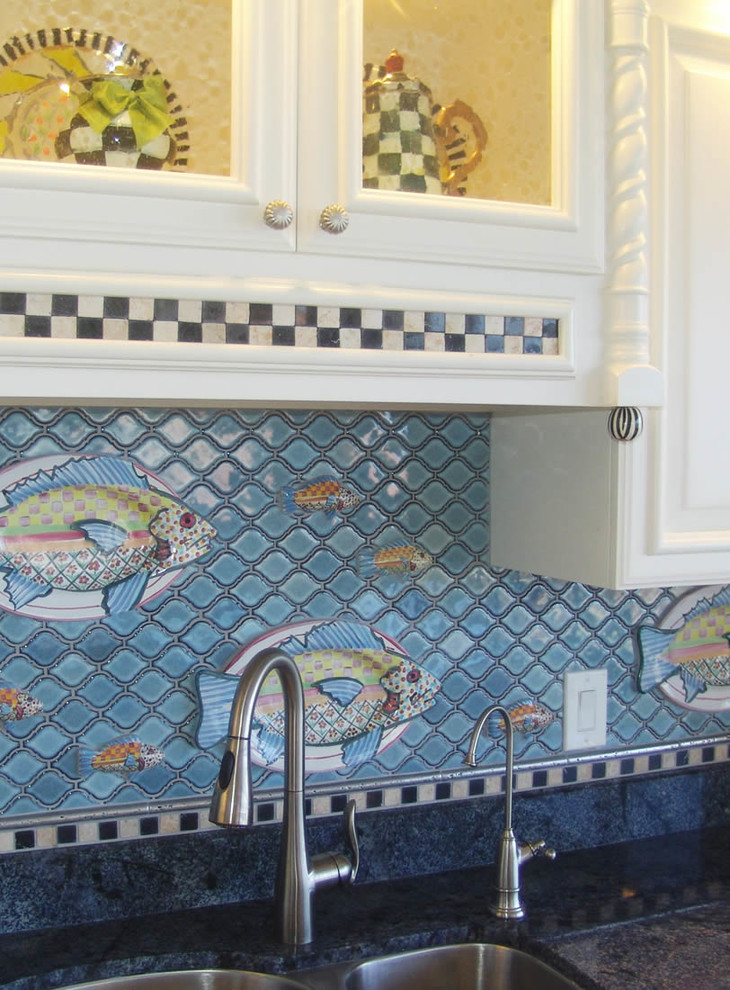 Inspiration for a mid-sized eclectic galley eat-in kitchen remodel in Austin with an island