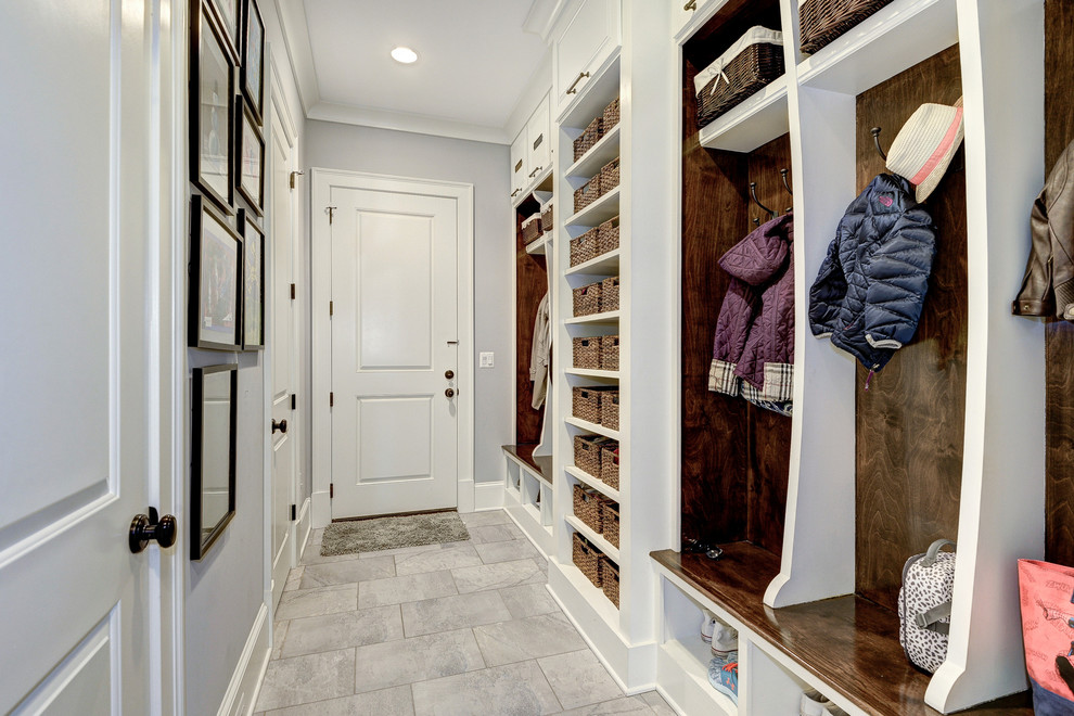 Inspiration for a small traditional mudroom in DC Metro with grey walls, medium hardwood floors, a single front door and a white front door.