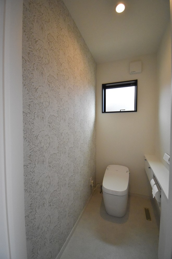 This is an example of a modern powder room in Other.
