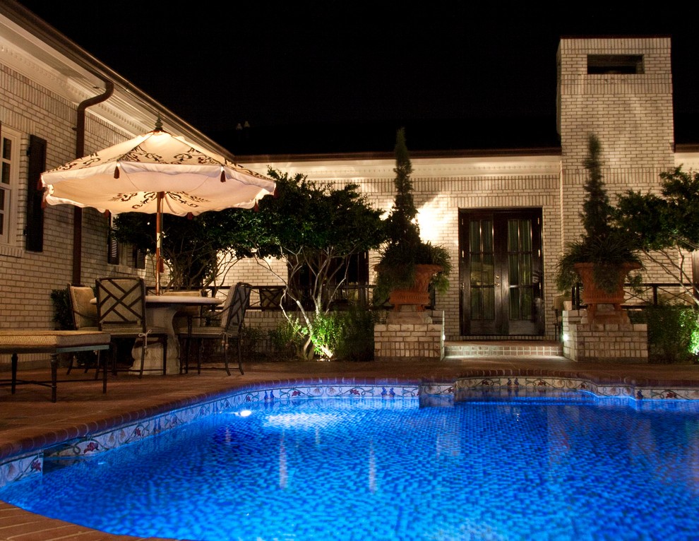 Inspiration for a transitional pool remodel in Austin