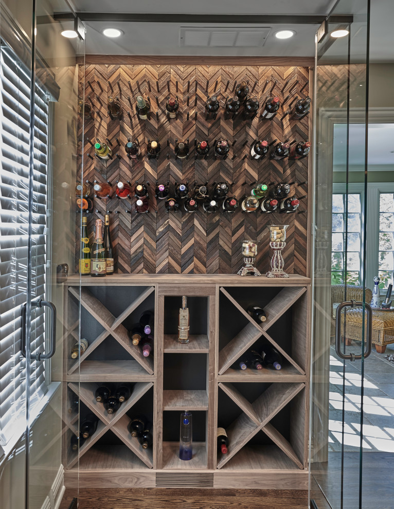 Large transitional wine cellar in Chicago with dark hardwood floors, diamond bins and brown floor.