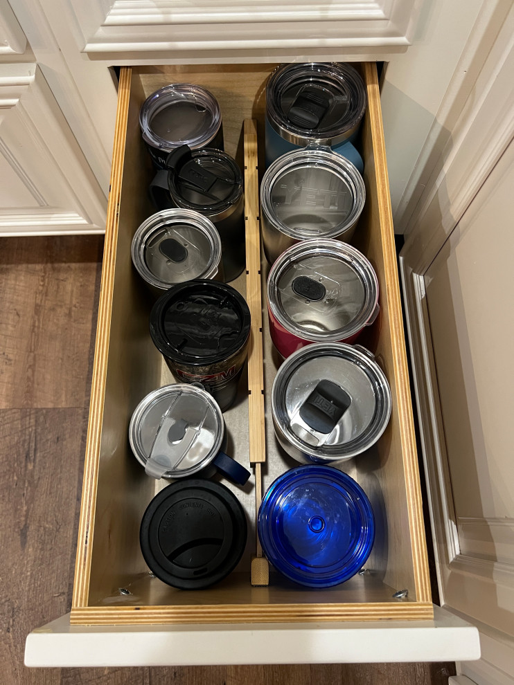 Organized Deep Drawer filled with sports bottles