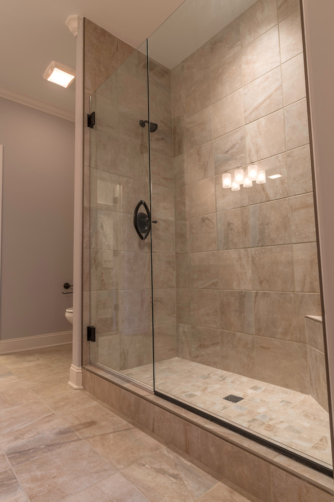 Example of a mid-sized transitional master beige tile and ceramic tile ceramic tile alcove shower design with beige walls