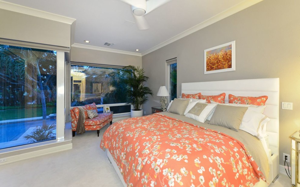 This is an example of a contemporary bedroom in Tampa.