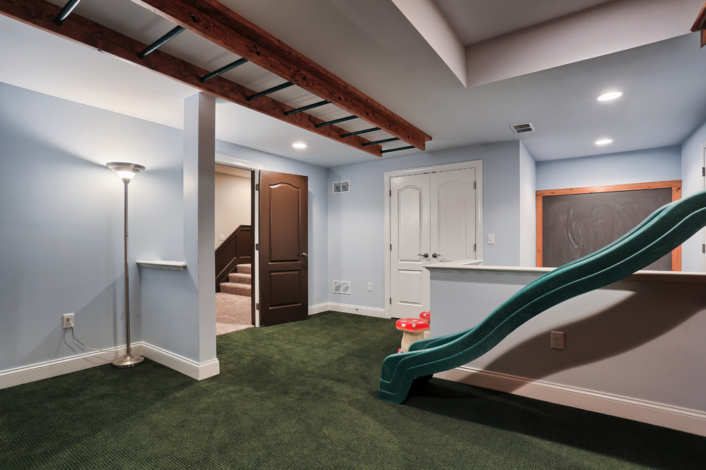 Design ideas for a mid-sized traditional gender-neutral kids' playroom in Other with grey walls and carpet.