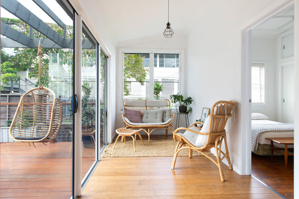 Photo of a contemporary bedroom in Newcastle - Maitland with tatami floors.