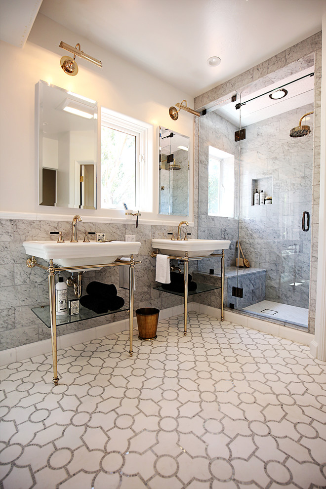 Photo of a mid-sized traditional master bathroom in San Francisco with a freestanding tub, an alcove shower, a one-piece toilet, white tile, stone tile, white walls, mosaic tile floors, a pedestal sink and solid surface benchtops.