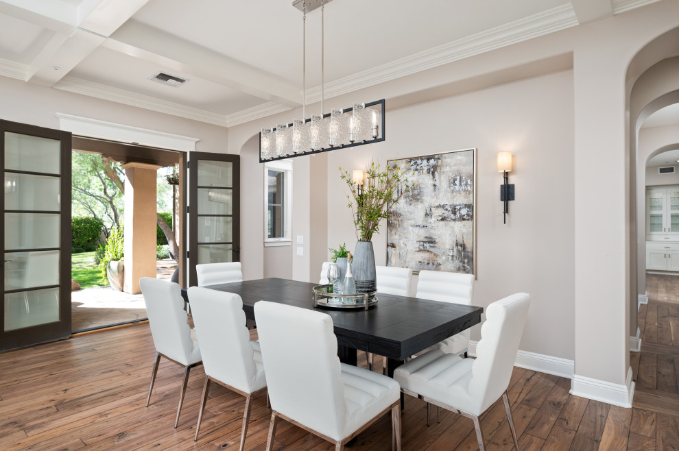 Large transitional open plan dining in Phoenix with grey walls, medium hardwood floors and coffered.