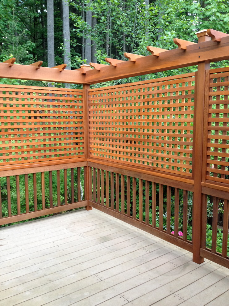 Inspiration for a backyard deck in Seattle with a vertical garden and no cover.