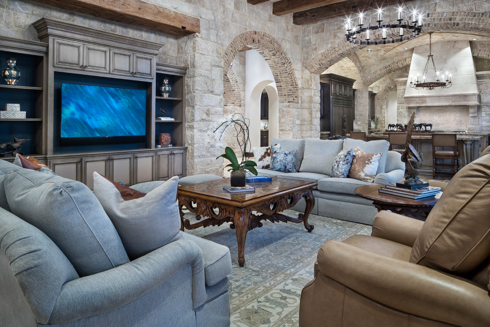 Photo of a large mediterranean open concept living room in Austin.