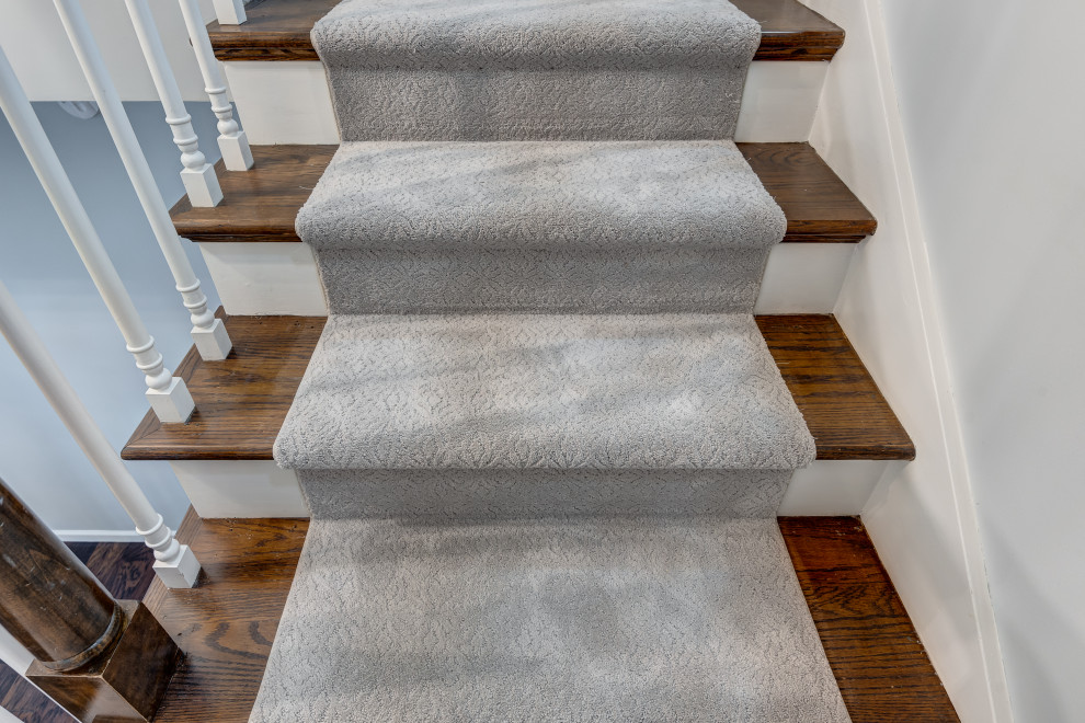 Inspiration for a transitional staircase remodel in Chicago