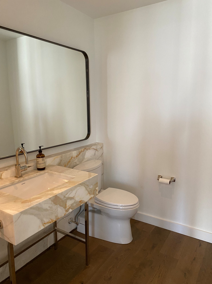 Medium sized contemporary cloakroom in New York with open cabinets, yellow cabinets, a two-piece toilet, white tiles, ceramic tiles, a built-in sink, engineered stone worktops, yellow worktops and a built in vanity unit.