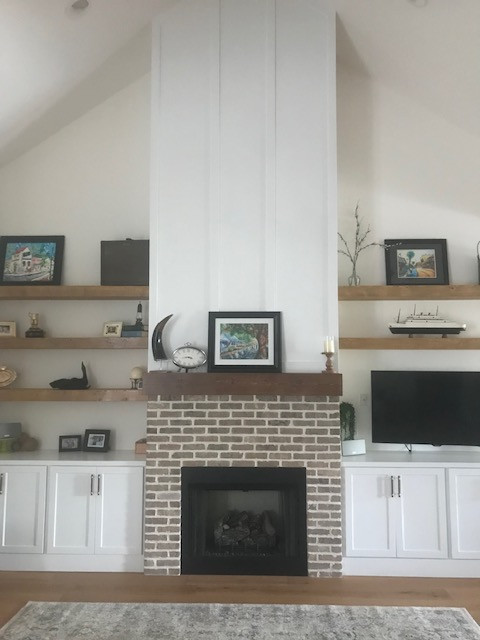 What size artwork over fireplace mantel