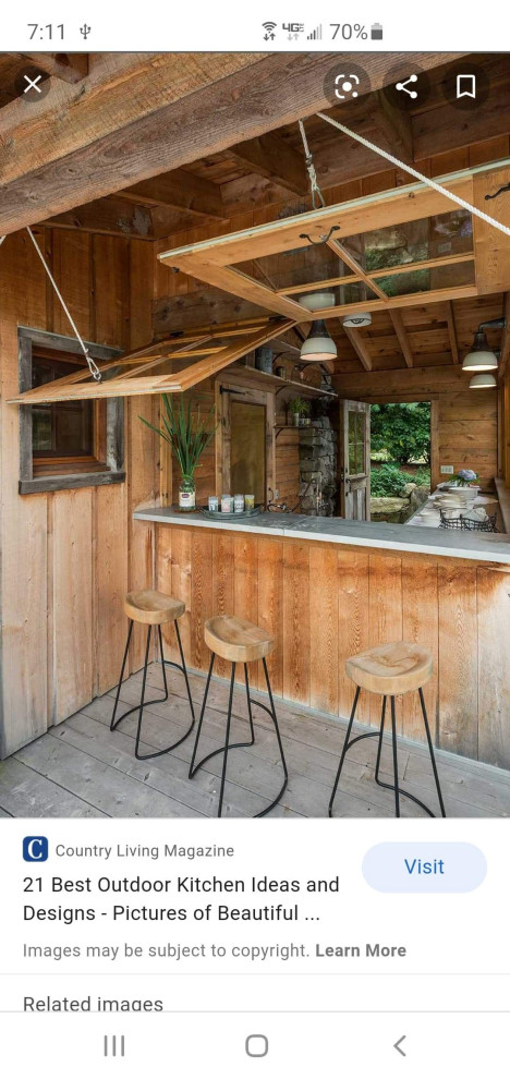 Example of a mountain style home design design in Austin