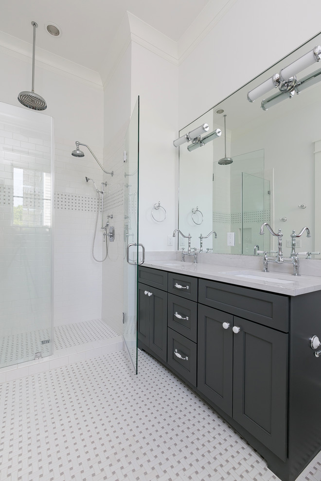 Inspiration for a large farmhouse 3/4 white tile and ceramic tile mosaic tile floor corner shower remodel in Charleston with furniture-like cabinets, gray cabinets, white walls, a vessel sink, quartz countertops and a two-piece toilet