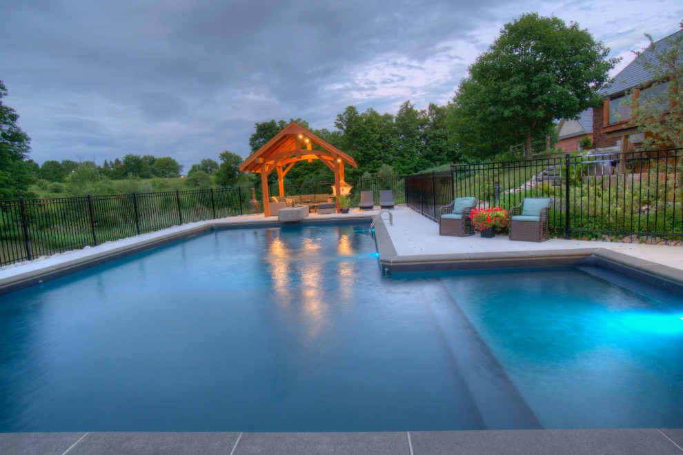 Inspiration for a craftsman pool remodel in Toronto