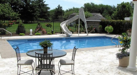 Inspiration for a backyard rectangular pool remodel