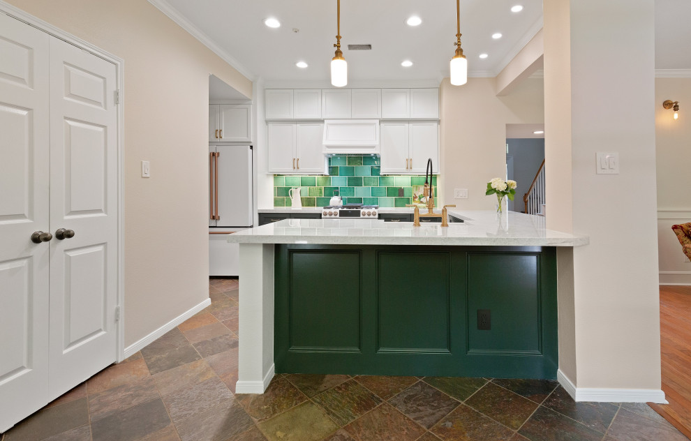 Eat-in kitchen - small traditional l-shaped eat-in kitchen idea in Houston with a farmhouse sink, beaded inset cabinets, green cabinets, quartzite countertops, green backsplash, ceramic backsplash, white appliances, an island and white countertops
