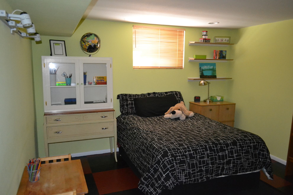 Example of a mid-sized transitional home design design in Denver