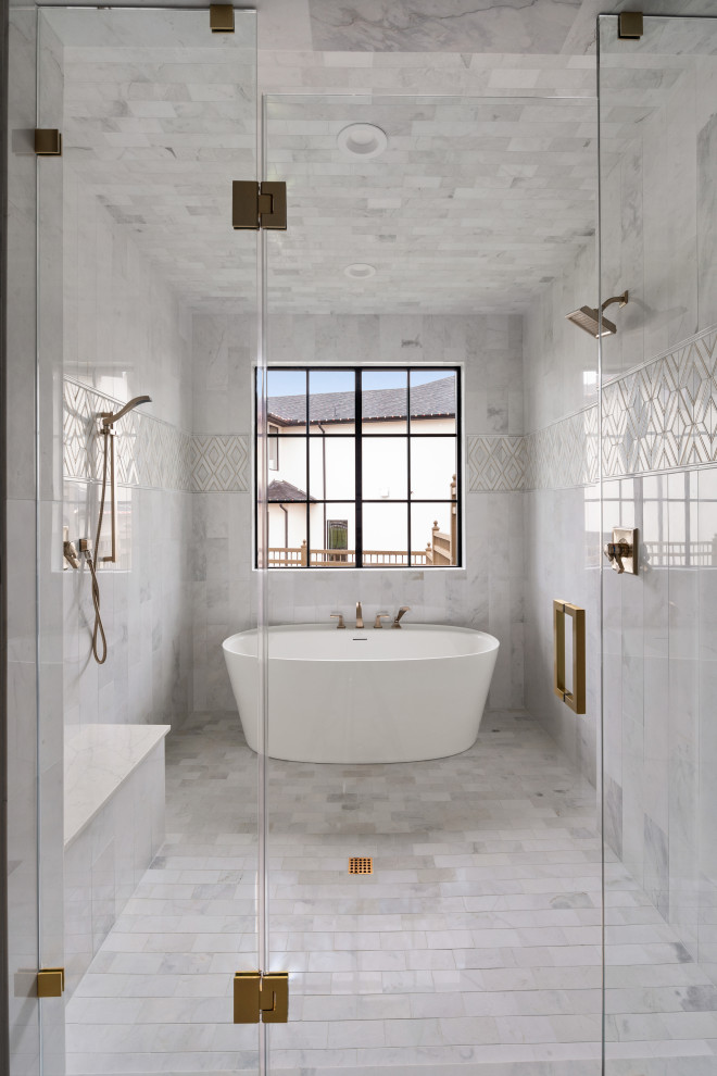 Design ideas for a large transitional master bathroom in Dallas with a freestanding tub, a shower/bathtub combo, white tile, marble, marble floors, white floor, a hinged shower door and a shower seat.