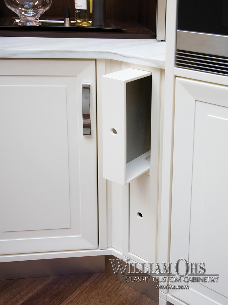 Example of a transitional kitchen design in Denver