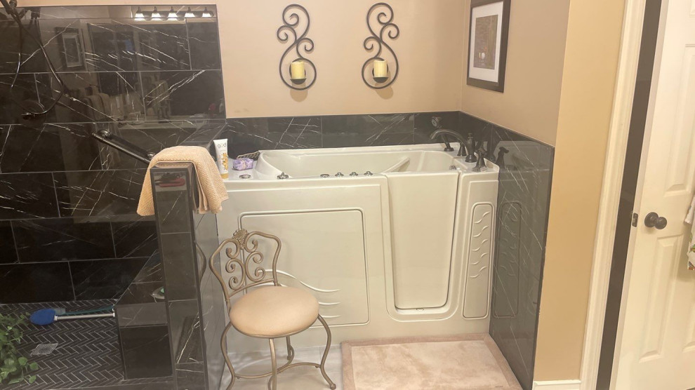 This is an example of a classic bathroom in Atlanta with a corner shower, porcelain flooring and a hinged door.