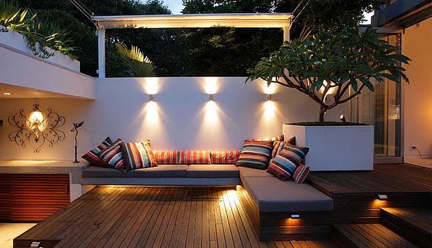 Inspiration for a mid-sized contemporary backyard patio in Denver with a container garden, decking and a pergola.