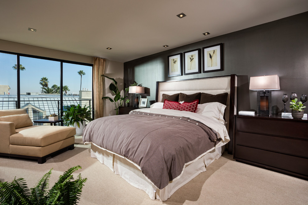 Inspiration for a large traditional master bedroom in Los Angeles with black walls, carpet and no fireplace.