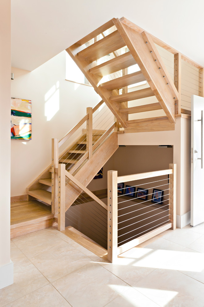 Inspiration for a modern staircase in Boston with cable railing.