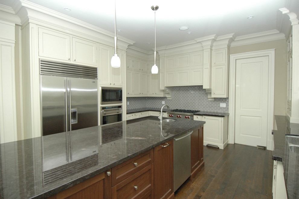 Example of a transitional kitchen design in Toronto