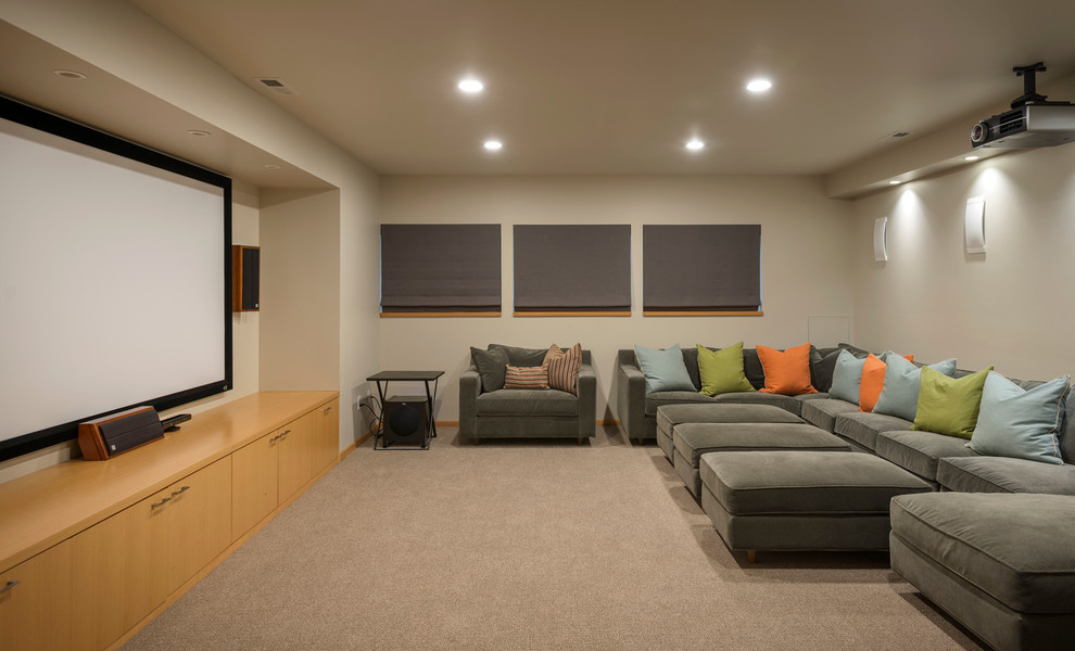 Design ideas for a contemporary home theatre in Seattle with a projector screen and grey floor.