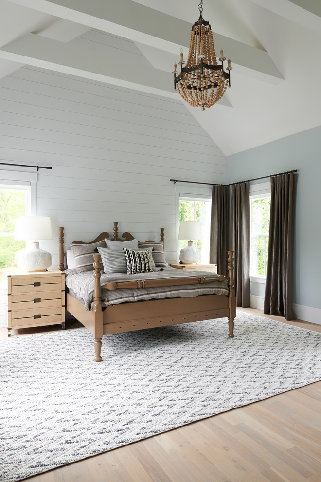 Example of a farmhouse bedroom design in New York