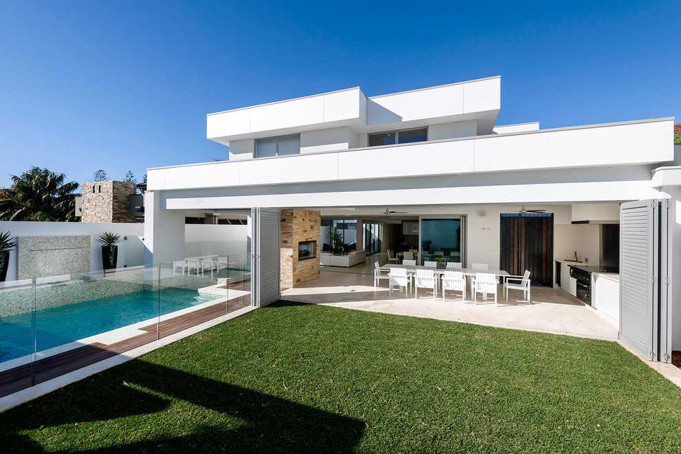 Design ideas for a large contemporary white exterior in Perth.