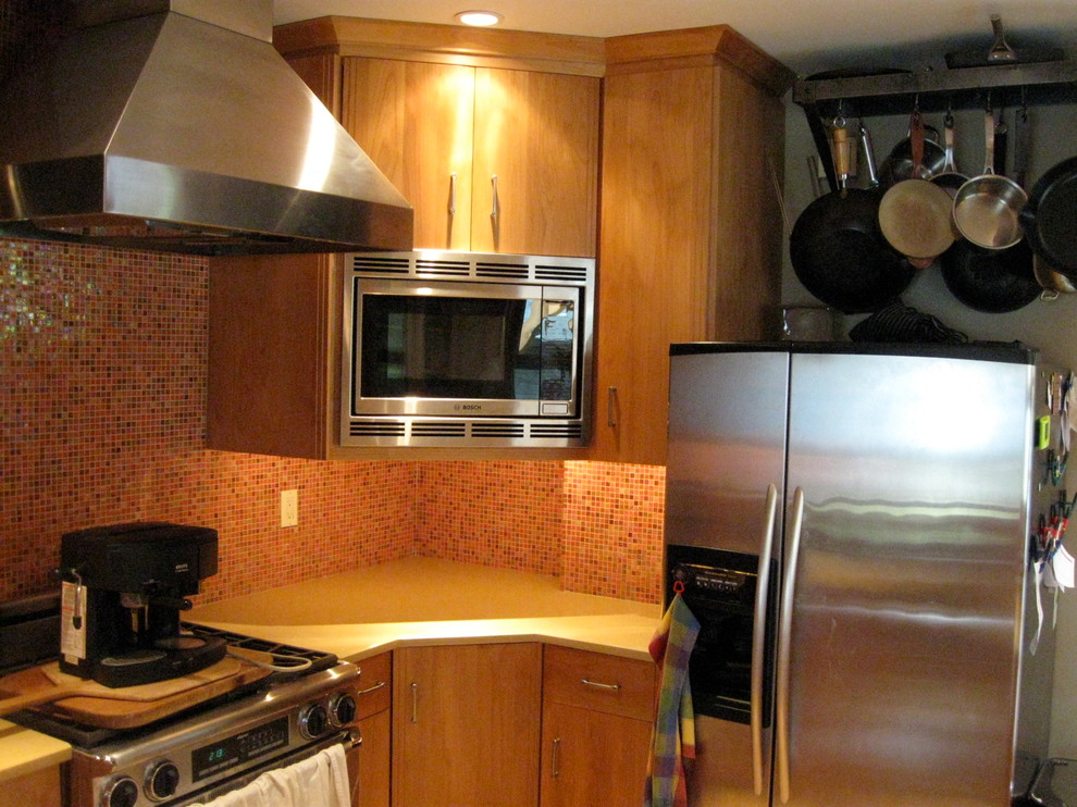 This is an example of a small midcentury kitchen in Portland.