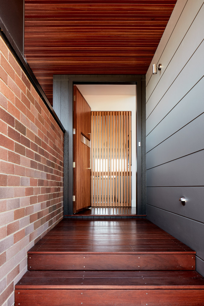 This is an example of a contemporary entryway in Sydney.