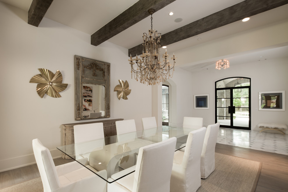 Design ideas for a transitional dining room in Houston.