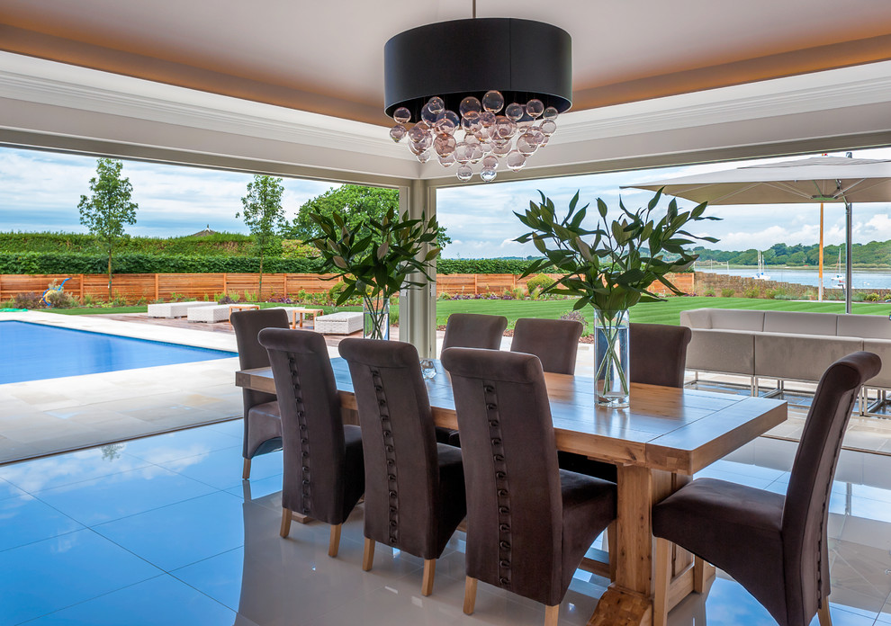 This is an example of a contemporary dining room in Berkshire.